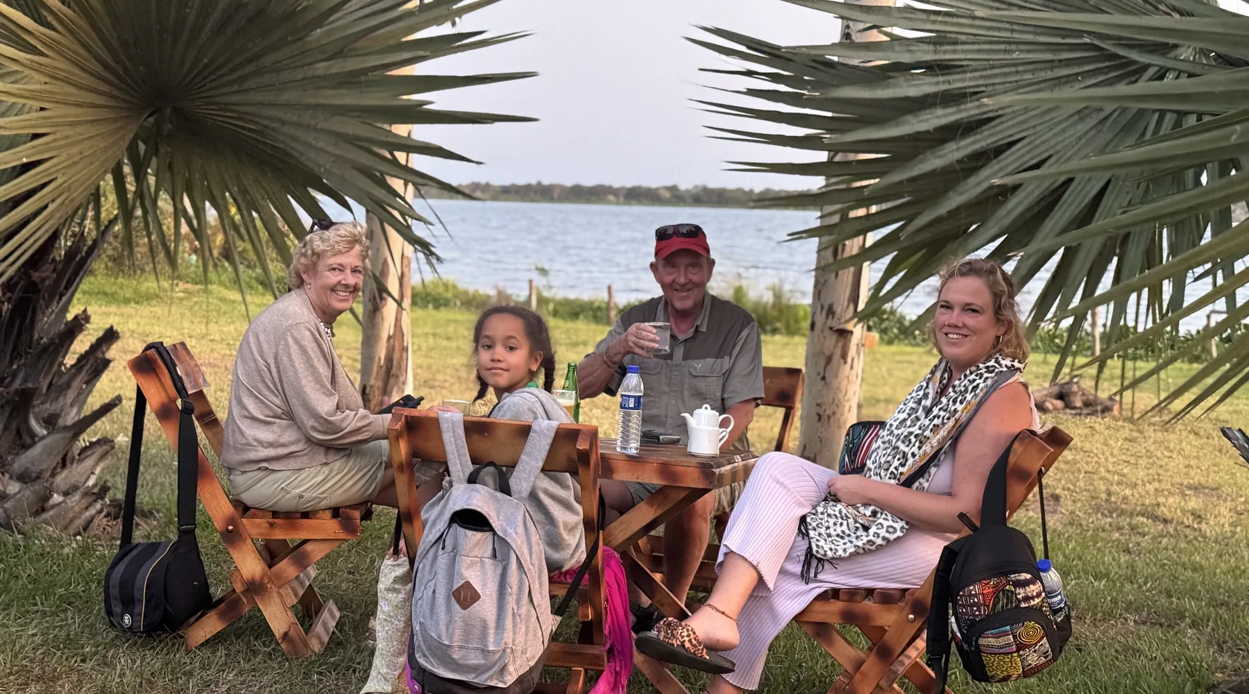 Family relaxing during a Uganda safari