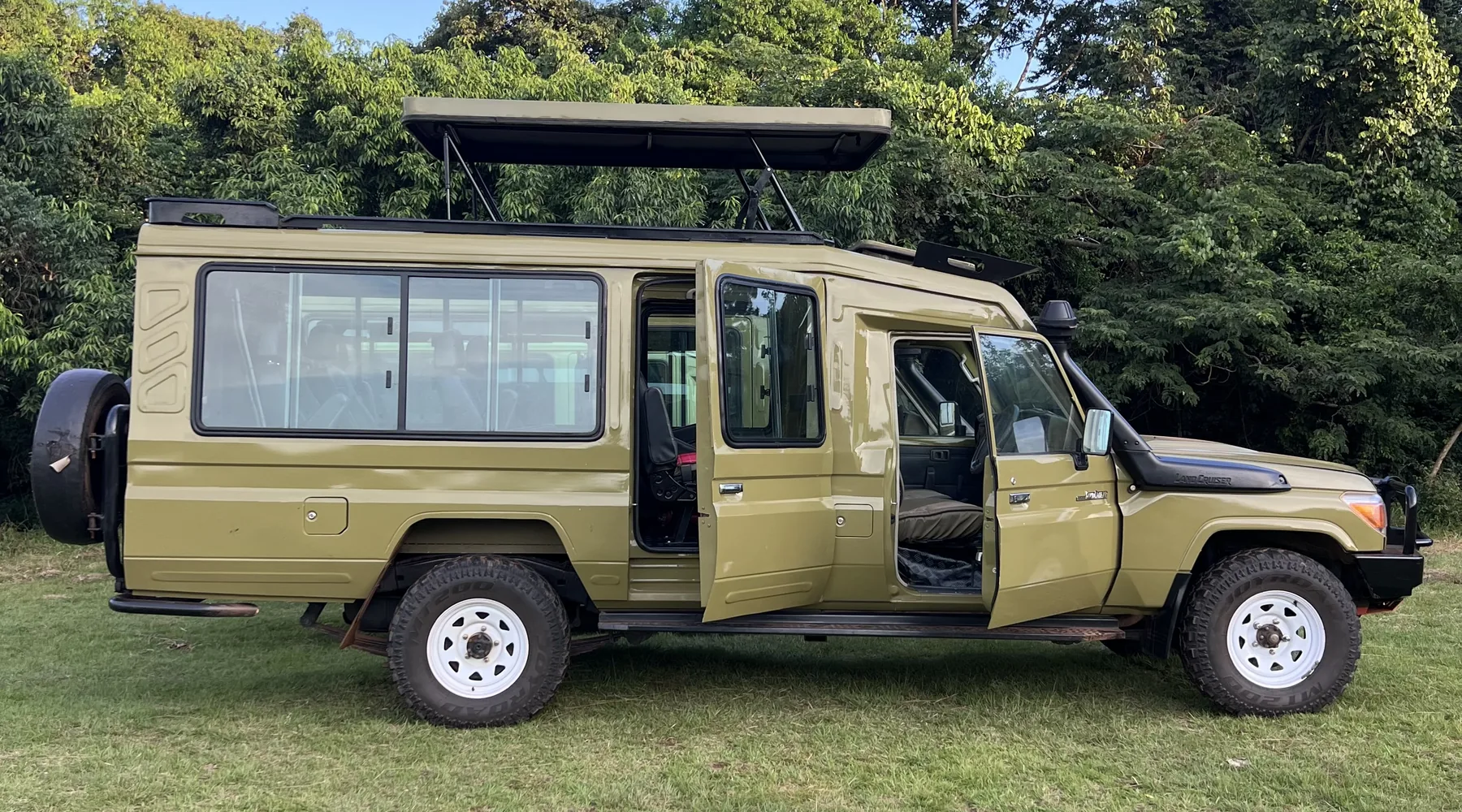 Private safari vehicle in Uganda wilderness