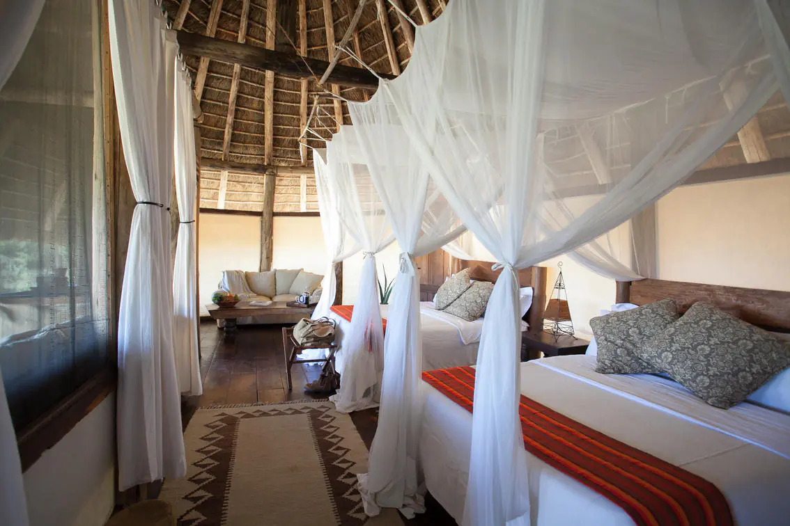 Outdoor rock bathtub overlooking the savannah at Apoka Safari Lodge