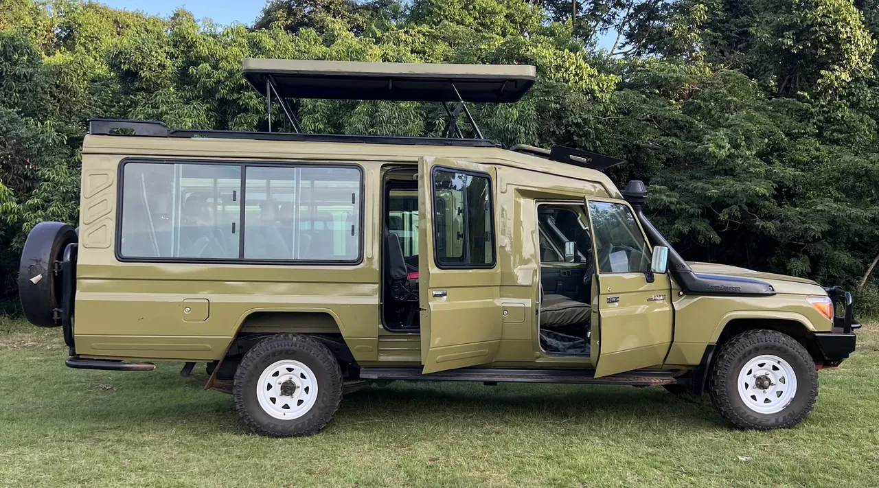 Private safari vehicle in Uganda wilderness